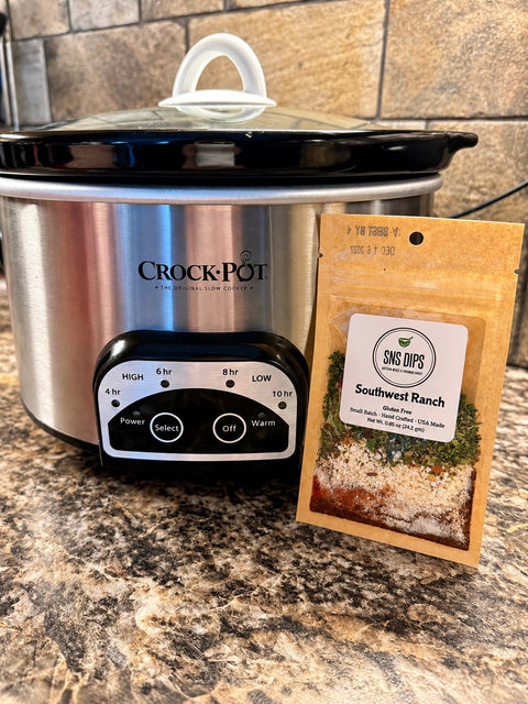 Bag of SnS Southwest Ranch Dip Mix next to a crockpot